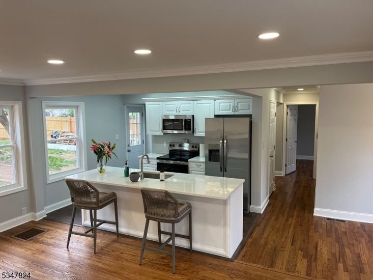 Interior, Kitchen, Recessed Lighting, Stainless Steel Appliances, Wood Texture Flooring
