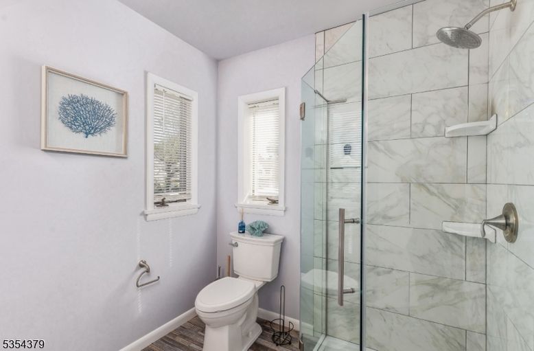 Bathroom, Glass Shower, Interior, Marble Walls, Wood Texture Flooring