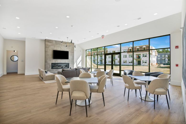 Dining room, Fireplace, Interior, Living room, Pendant Lights, Recessed Lighting, Wood Texture Flooring