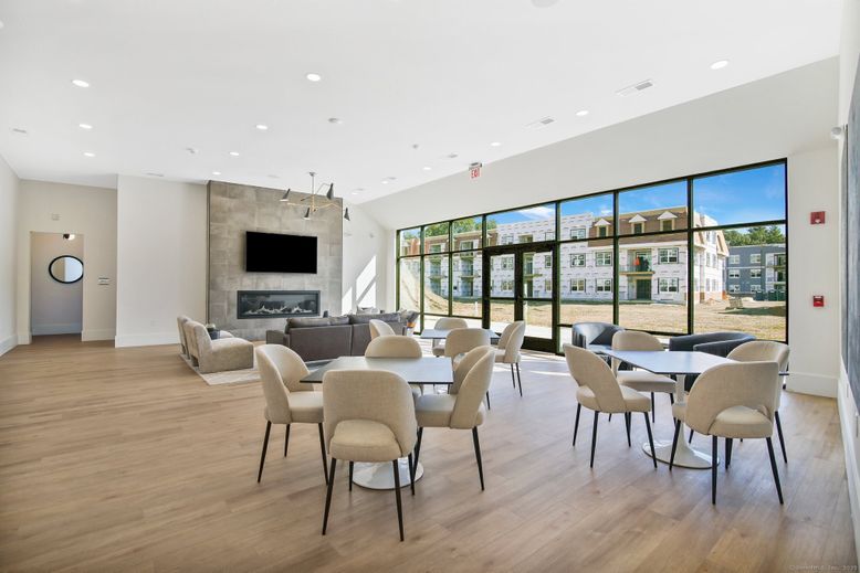 Dining room, Fireplace, Interior, Living room, Pendant Lights, Recessed Lighting, Wood Texture Flooring