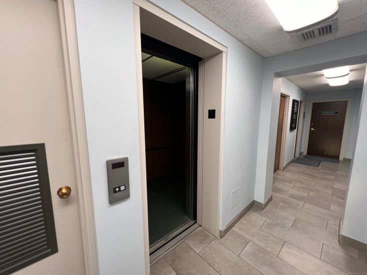Elevator, Interior, Wood Texture Flooring