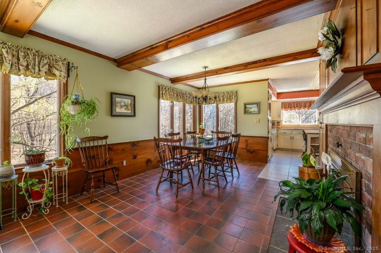 Chandelier, Dining room, Fireplace, Interior, Wooden Beams