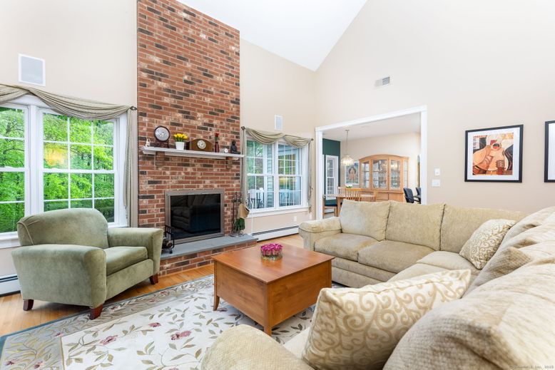 Dining room, Fireplace, Interior, Living room, Pendant Lights, Stone Walls, Wood Texture Flooring