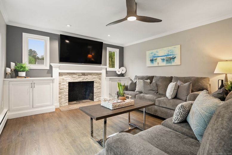 Fireplace, Interior, Living room, Recessed Lighting, Wood Texture Flooring